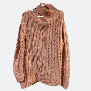 Sweater with open shoulder.